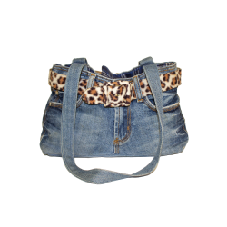 Denim handbag with a leopard print belt and long straps, styled like jeans.