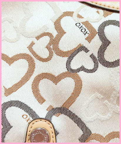 XOXO gray and brown heart pattern.
