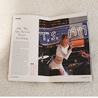 Spread in magazine showcasing a Taylor Swift performance.
