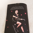 Back cover of small magazine showcasing a Taylor Swift performance.
