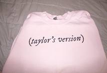 Light pink sweatshirt that reads (Taylor's Version).