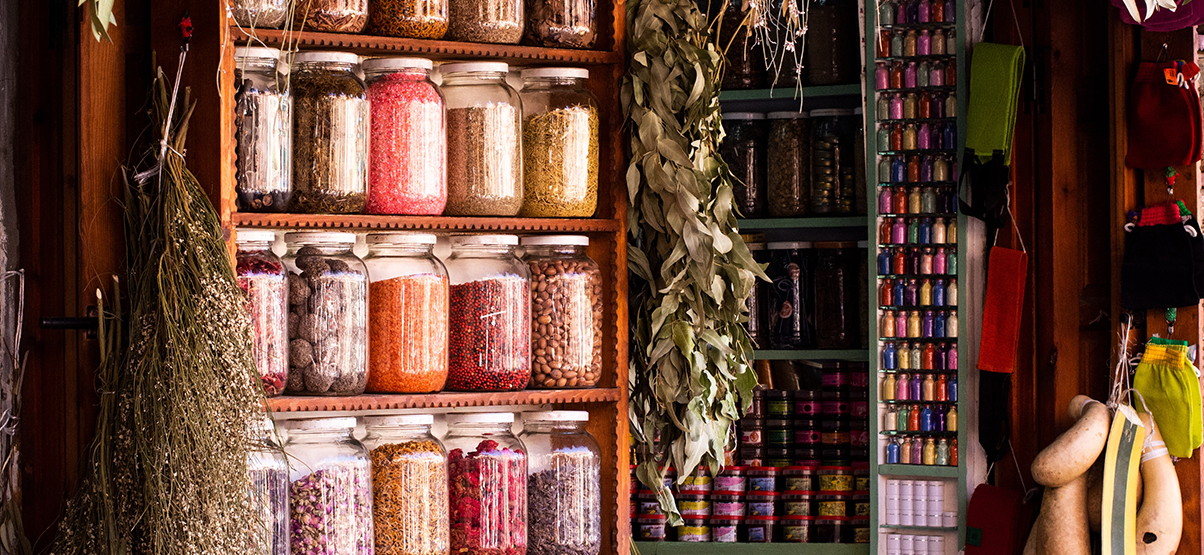 Spices line a street market in Velaris